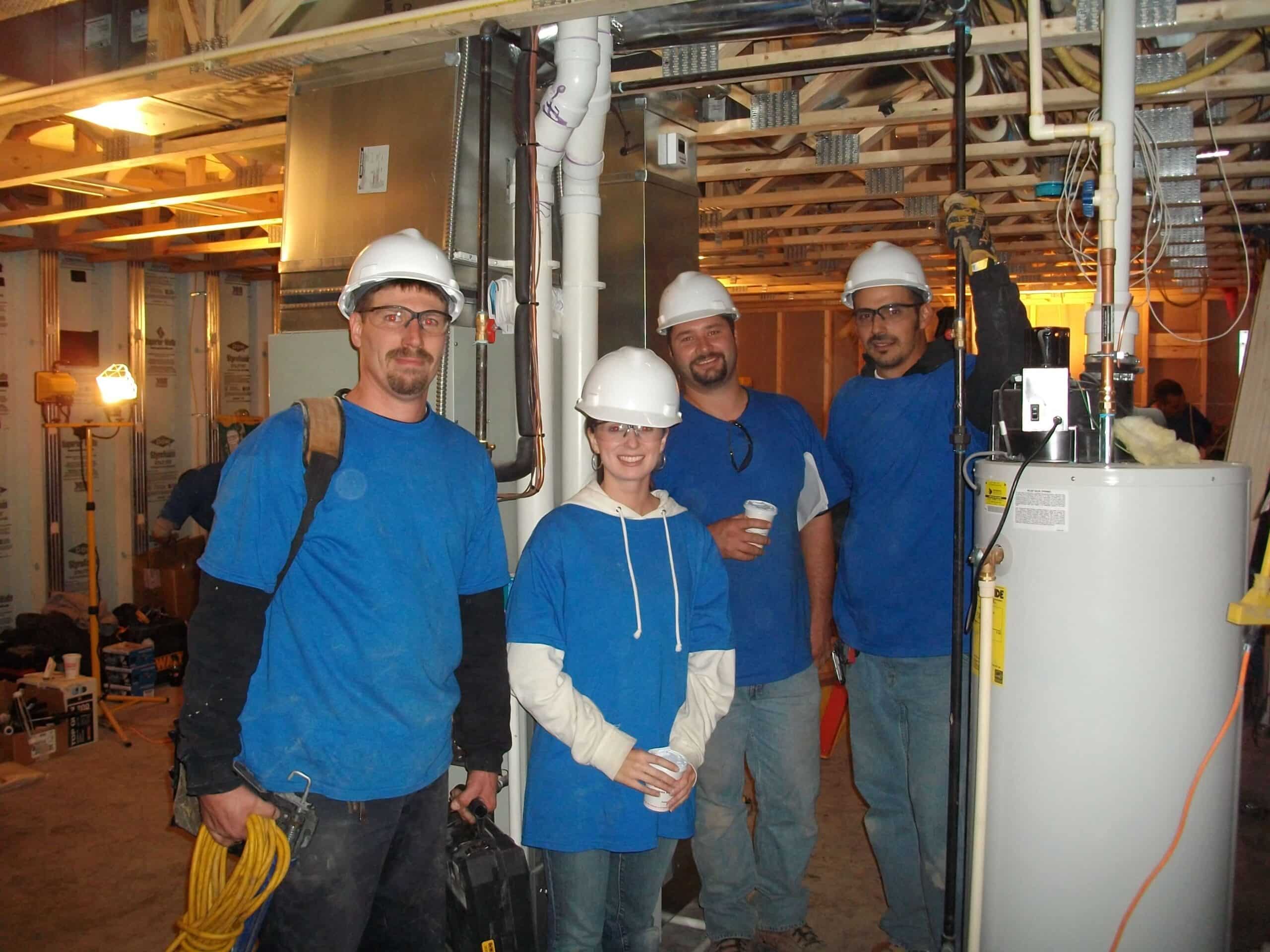 Geauga Mechanical Employees at Extreme Makeover Home Edition Job Site